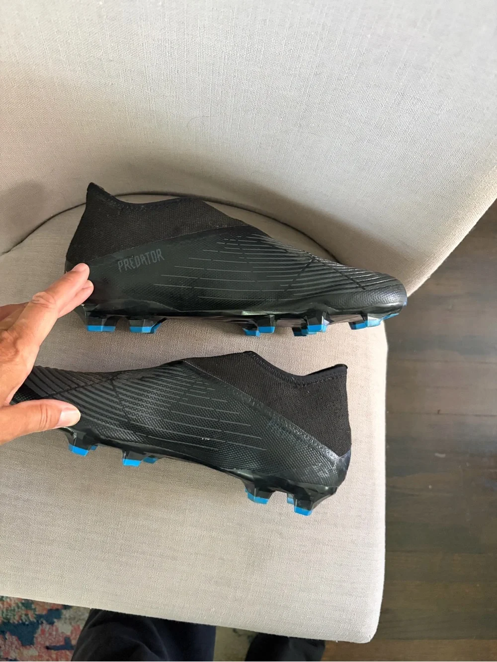 adidas Men’s Black Soccer Cleats with Blue and Red Trim